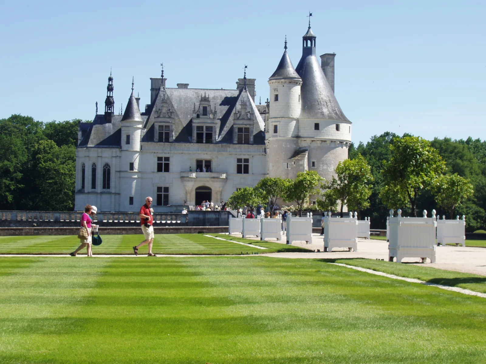 The lawn approach to Château de Chenonceau with its round Marques tower