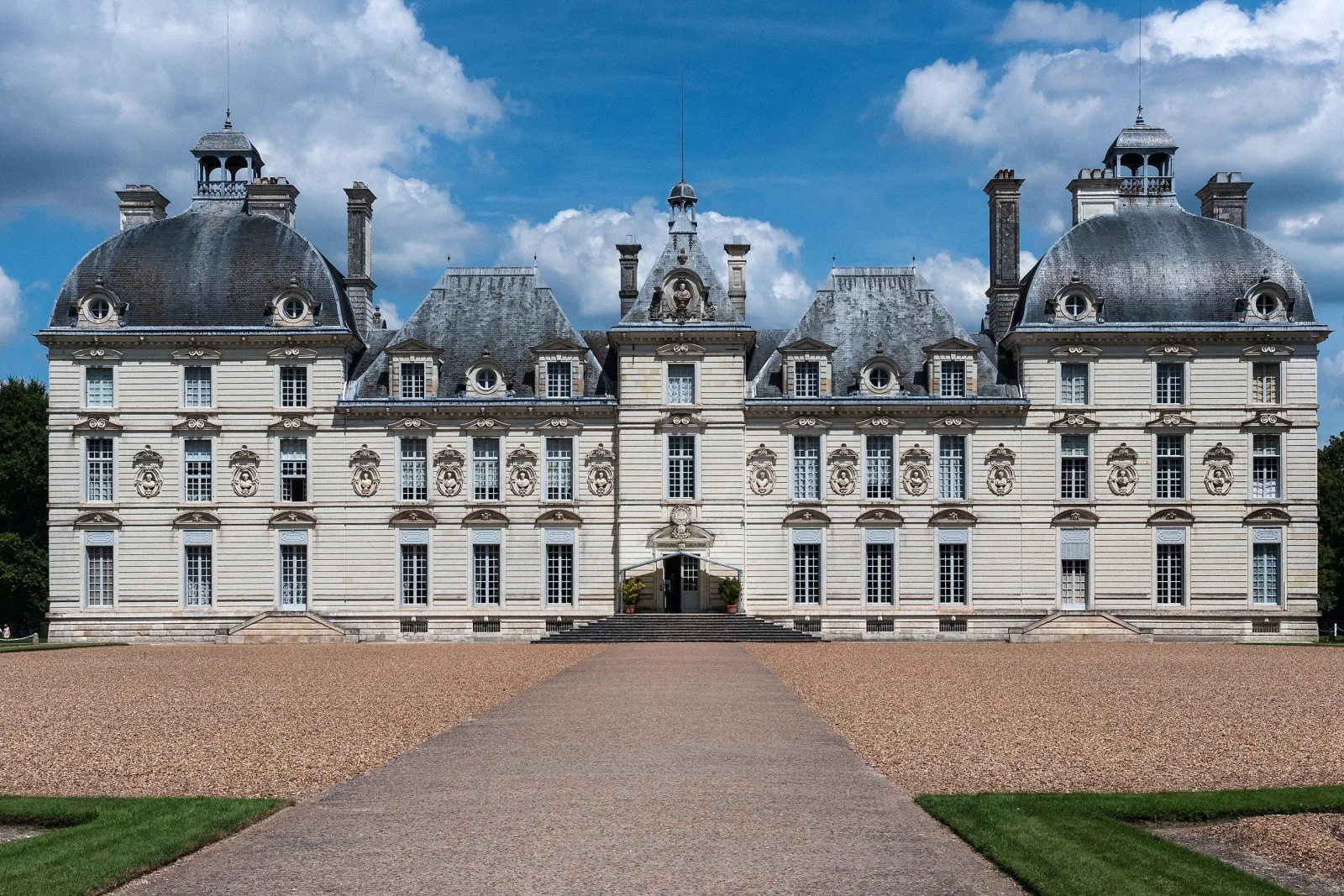The garden front of Château de Cheverny from the gravel drive