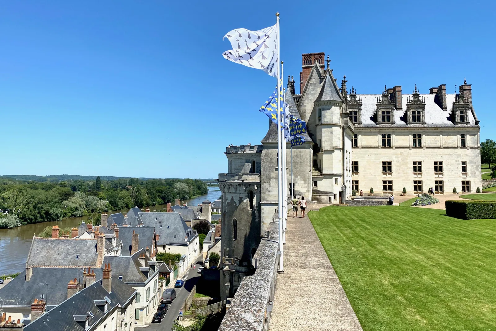 The royal standard flying over Château d'Amboise and the Loire below