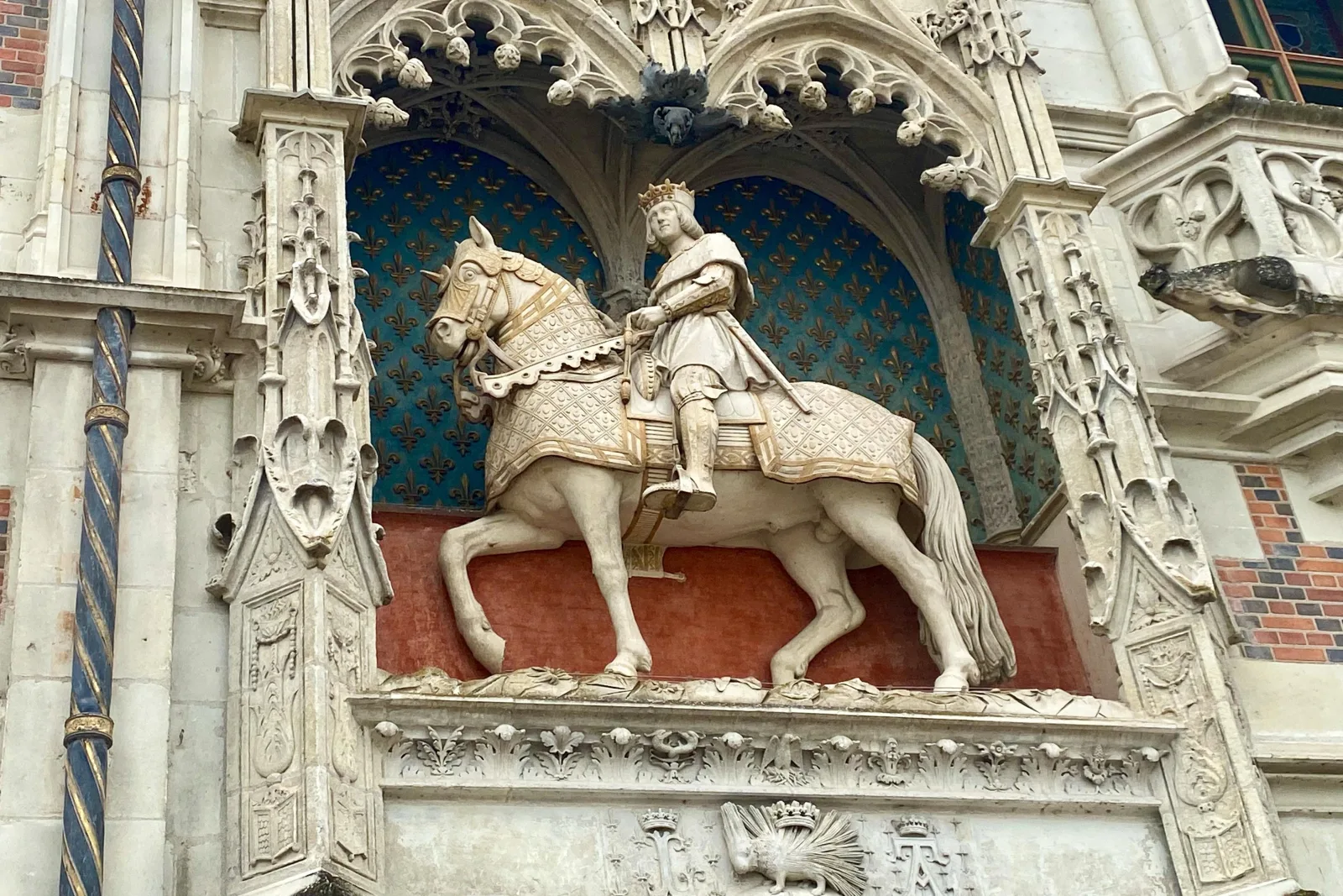 The equestrian statue of Louis XII on the gatehouse at Château de Blois