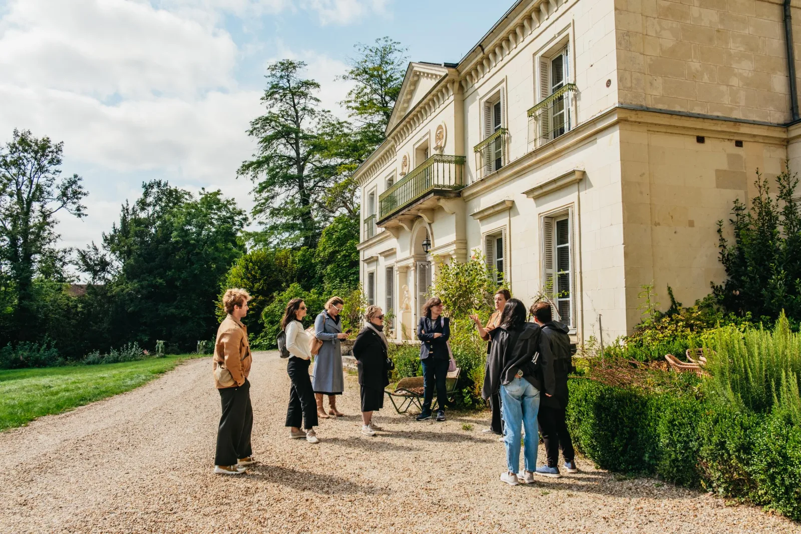 Guests arriving on foot at a Loire Valley wine estate house