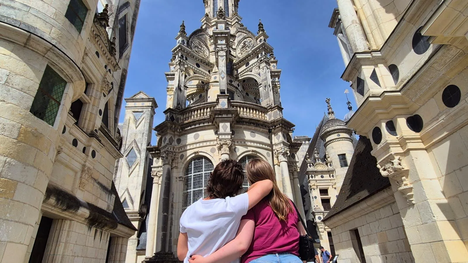 Looking up at Chambord's lantern tower and carved dormers from the roof terrace